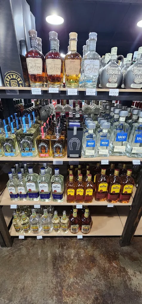 Tequila shelf at Trenton Liquors, including 1800, Casamigos, and Jose Cuervo